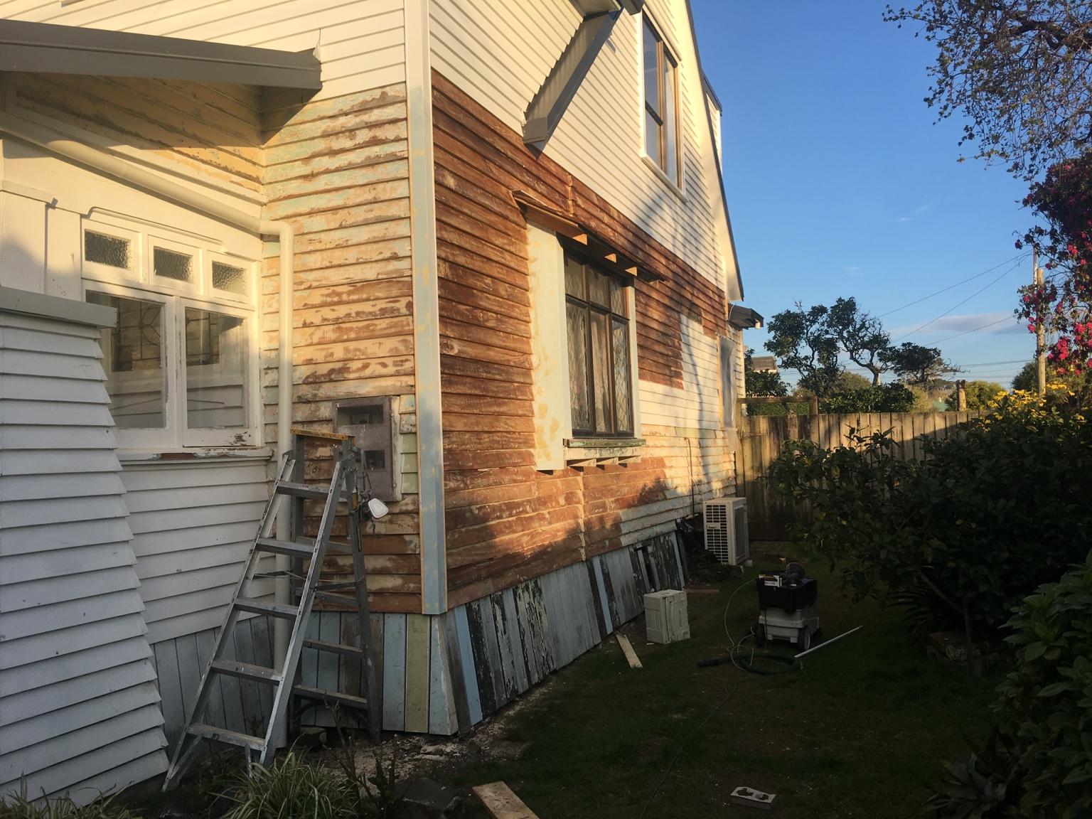 Before image of side elevation during prep