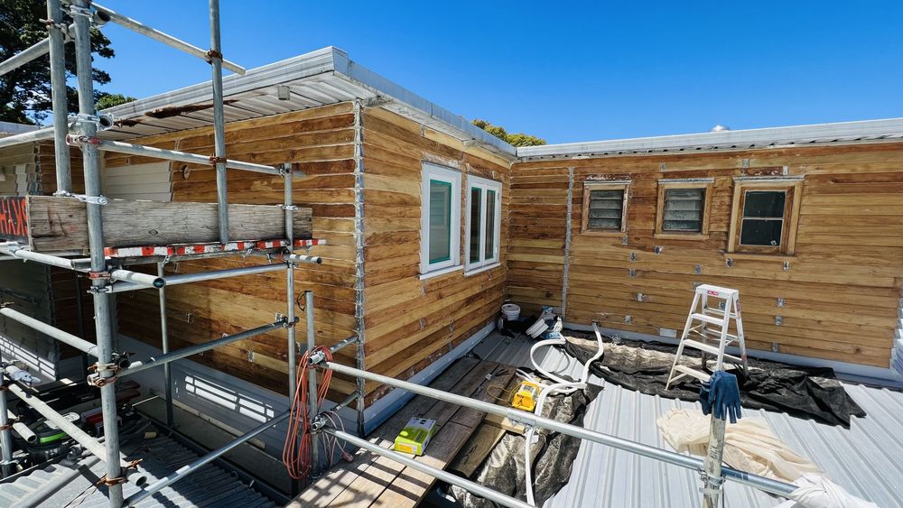 Restored French doors stripped to natural honey timber Auckland